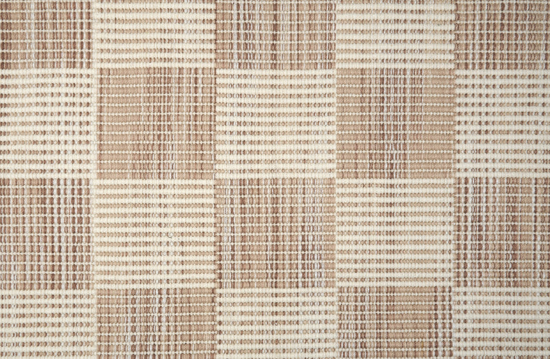 Checkered beige and brown fabric pattern rug with textured design