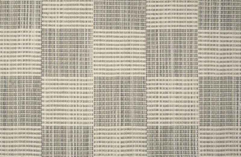 Textured gray and white checkered rug pattern