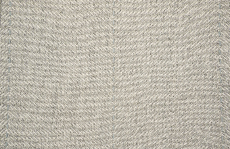 Textured gray fabric rug pattern with subtle woven design