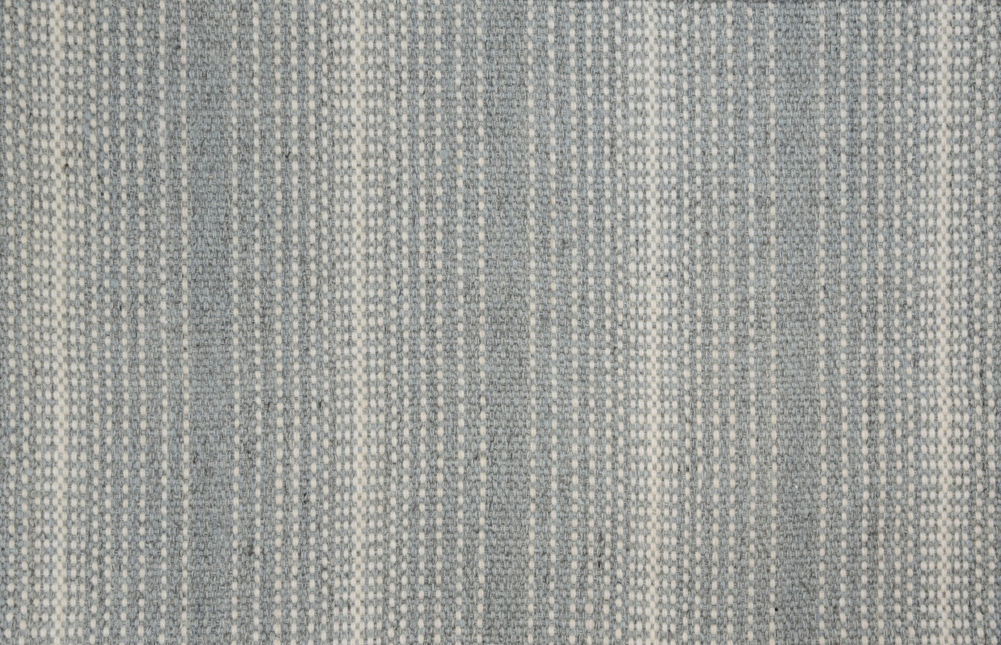 Textured gray fabric rug with subtle striped pattern