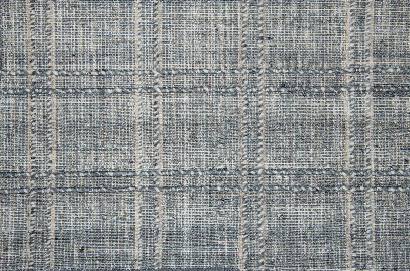 Textured gray and beige checkered tweed rug pattern